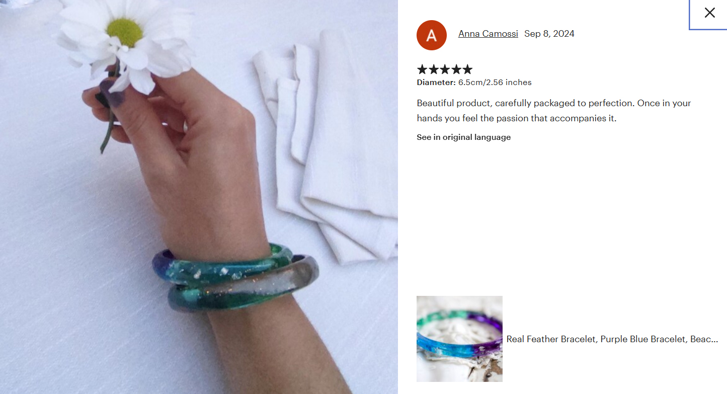Recensione originale su Etsy con foto: bracciale floreale al polso di una cliente
